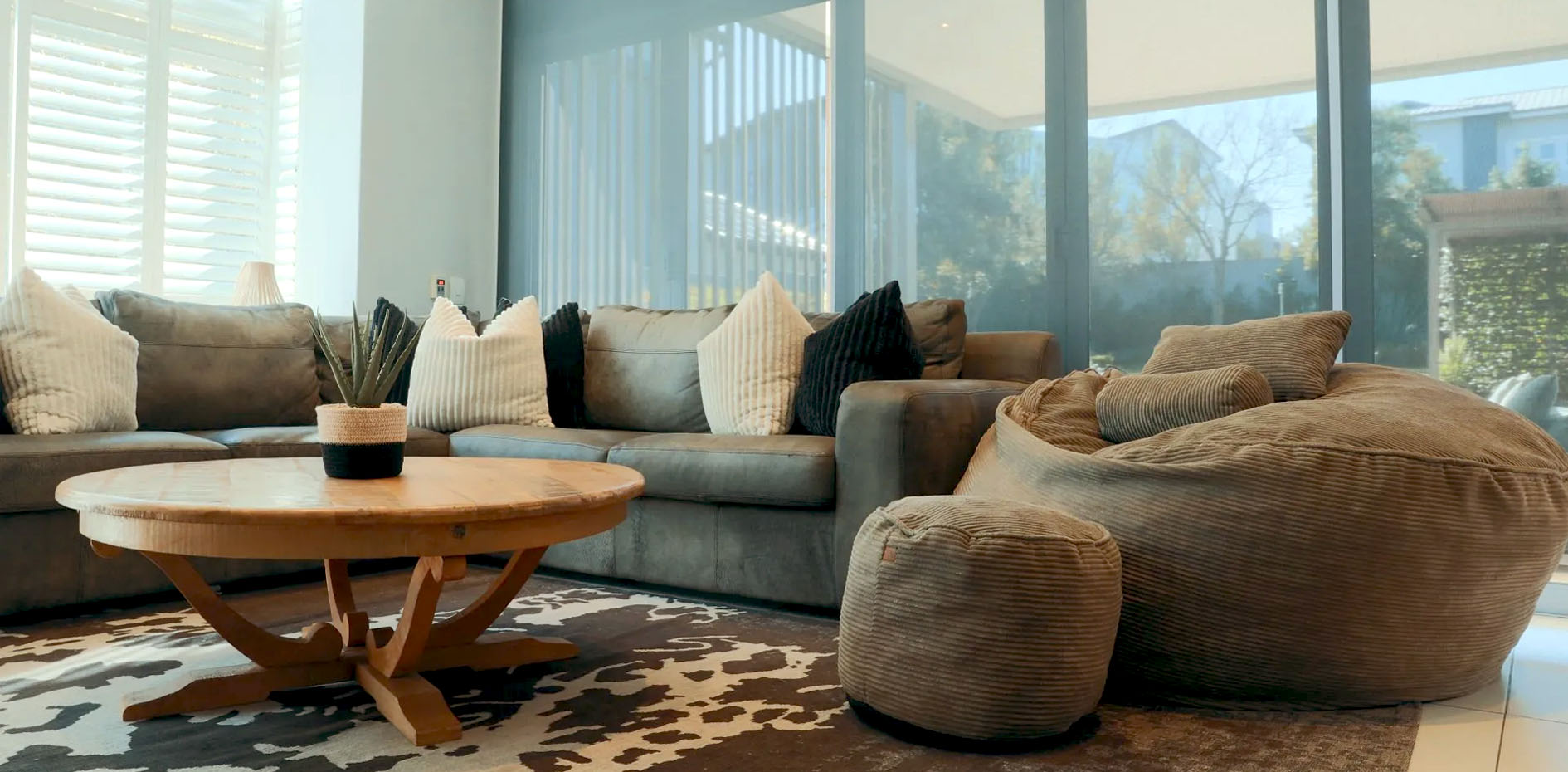 Bespoke residential interior design by edge.ids featuring a beautiful modern custom lounge with expert spatial planning.