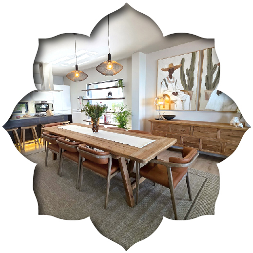 Residential dining room styled by edge.ids Interior Design Services Johannesburg featuring a custom wooden table, leather chairs, and curated art