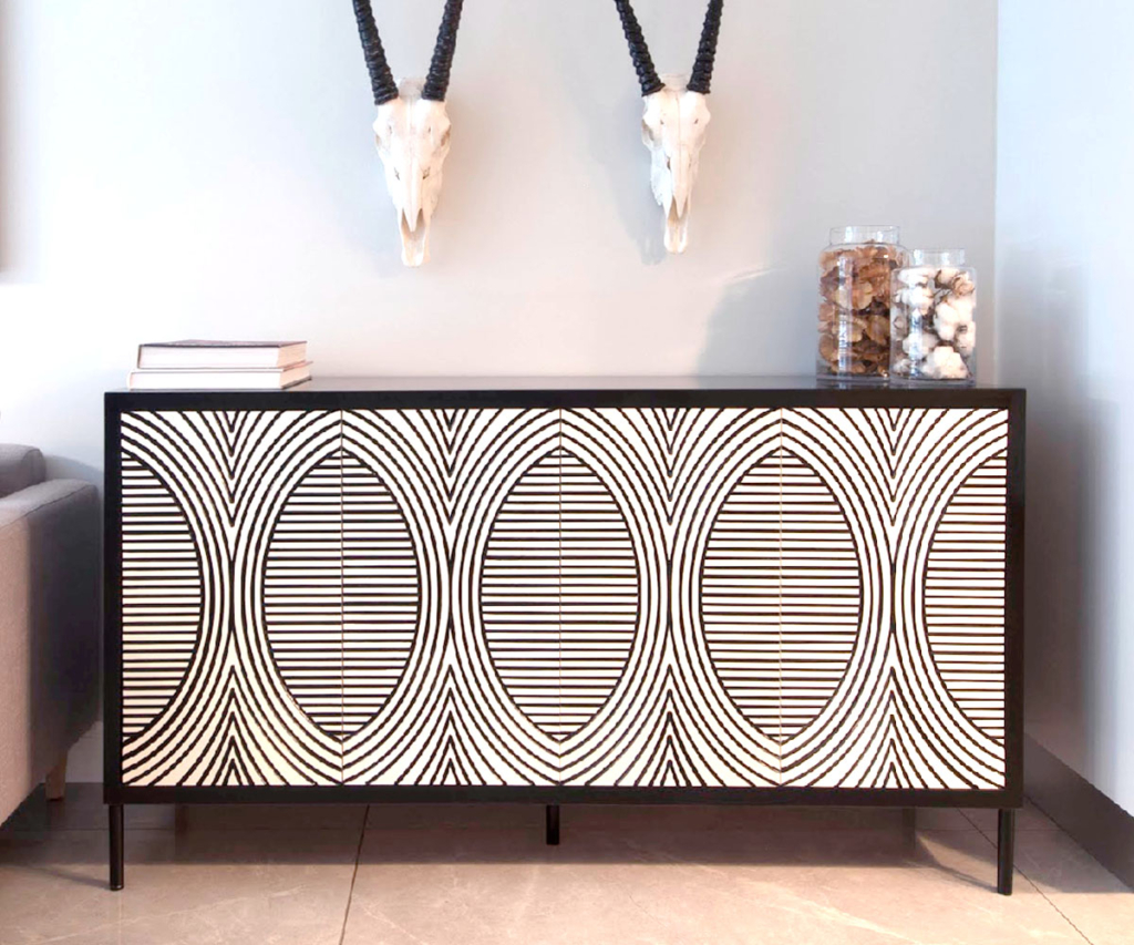 Custom-manufactured black and white geometric server by Edge-IDS, featuring architectural line patterns and nature-inspired wall decor.
